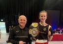 Coach Adrian Fleming and Ella Thompstone after her national success