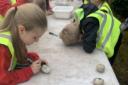 Pupils from St John's CE Primary School have been decorating pebbles at Faith in Nature