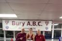 FINALS APPEARANCE: Bury ABC's Ella Thompstone, centre, with her coaches