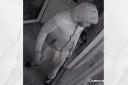 A CCTV image of a man police are looking for in relation to the burglary