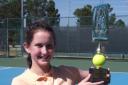 Natalie Flinn proudly displays her trophy after winning the Lake Cane Championships in Orlando, Florida