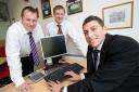Bolton School student Paul Walker, right, with Paul Alexander, left, and Ian Settle of the Royal Bank of Scotland