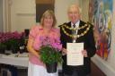 The Mayor of Bury, Councillor Peter Ashworth, presents Anne Noble with her first prize for the best patio and back garden category at Elms In Bloom