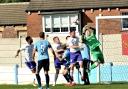 UP FOR IT: Ramsbottom United put the pressure on Ossett keeper Brett Souter. Pictures by Frank Crook