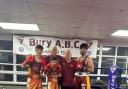 Bury ABC fighters, from left, Amaani Afsar, Zade Afsar and Zakir Khan with club coaches Mick Jelley and Colin Carr
