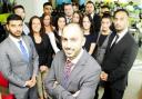 Chief executive Imram Akram, centre, with staff at Asons Solicitors