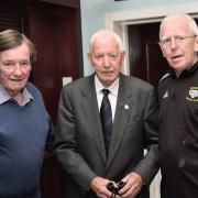 Jack Wolfenden with Rammy football chairman Harry Williams and cricket chairman Rod Hamer