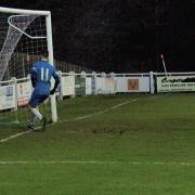 NIC A GOAL: Nic Evangelinos scores against Brighouse. Pictures by Frank Crook