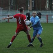 Prestwich Heys' Nathan Emery feels the impact of a challenge against Chaddterton. Picture: Beth Lee