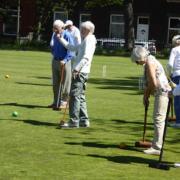 DEMO: People being advised in how to play Croquet