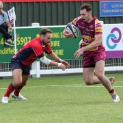 ON THE ATTACK: Try scorer Rhys Henderson in action for Sedgley Tigers