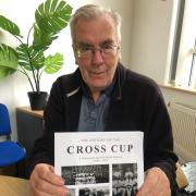 Nick Chamberlain with his book about the Cross Cup. Picture by David Pye