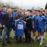 Steve Wilkes celebrates 1200 games in charge as a manager with Ramsbottom United players and staff Picture: Leo Michaelovitz