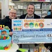 From left; Winner Jess Smith, her wife Stacey and Phil Fellone from the Made In Bury team