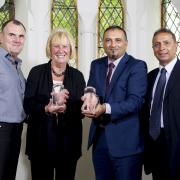 MAJESTIC Pictured with the awards are, from left, Yvonne Lane and Steve Edge from Jigsaw and Tan Ahmed and Mohammed Ishaq from ADAB