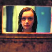 Olivia Cooke has a room with a view in the British horror film The Quiet Ones.