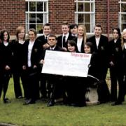 Children from Tottington High School with Matthew Brown of the Children’s Trust Charity