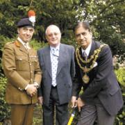 The Mayor of Bury, Councillor Farook Chaudhry performs the groundbreaking ceremony that will give Bury's famous Fusiliers a new home. With him are (left) Colonel Brian Gorski, the museum's fundraising manager, and Coun Bob Bibby, leader of Bury Council