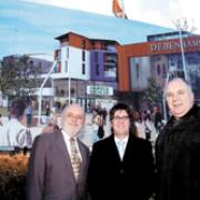 A vision of what's to come: with the new banners are, from left, Mr Mark Sanders, council chief executive, Mr Peter Warden of Thornfield Properties, and council leader Wayne Campbell