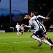 Bury forward Byron Moore and Notts County defender Richard Duffy during the Sky Bet League 2 match between Notts County and Bury FC at Meadow Lane on Saturday. Picture by Andy Whitehead