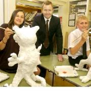 LIFE-SIZE: From left to right are: Sophia Wadood, aged 12, assistant head teacher, David Evans, and Nathan Lawrence, aged 11