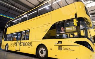 Greater Manchester mayor Andy Burnham inside one of the new Bee Network buses