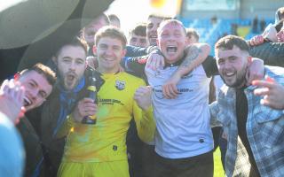 Radcliffe captain Nicky Adams and goalkeeper Mateusz Hewelt celebrate with supporters