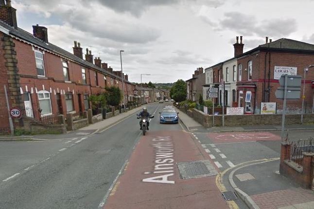 Young woman taken to hospital after paramedics called to street