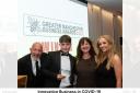 Harry Nixon and Karen Townsend, two members of Legacy Pets, accepting the award on Friday night