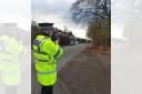 A police officer with a speed gun in Prestwich on Thursday