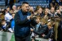 New Bury boss Dave McNabb applauds fans at Gigg Lane on Tuesday night after his first game in charge Picture: Phil Hill