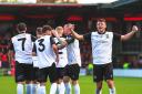 Radcliffe players celebrate at FC United Pictures: Barkley Costello