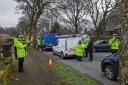 Police and licensing officers conduct traffic patrols on Manchester Road, Bury
