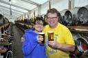 MOVE: Charlotte Othen from Bolton Lads and Girls Club with Bolton Beer festival organiser Clive Nightingale at last year's event