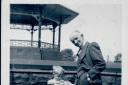 Ian McGuinness and his grandfather Jim Killingbeck at the bandstand at Whitehead Park