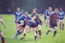 Bury Broncos (blue strip) in action in a 16-12 defeat at home to Halton Farnworth Hornets