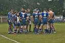 Bury Broncos hold an impromptu team meeting on the pitch following defeat at Leigh Miners Rangers A