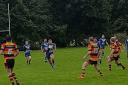 Bury Broncos attempt to make inroads in the Pilkington Recs defence in their narrow 13-10 defeat on Saturday