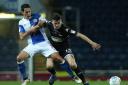 MY BALL: Bury's Callum Reilly holds off the challenge of Blackburn's Peter Whittingham at Ewood Park