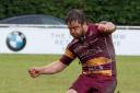 ALIVE AND KICKING: Sedgley Park’s Steve Collins got points on the board