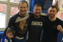 VISIT: John Kavanagh, second right, with head of SBG Bury, Glyn Powditch, Ted Powditch, aged sis, and head of SBG Rochdale, Bellator fighter Martin Stapleton 