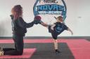 Lexie Clark teaching at Novas Freestyle Martial Arts Academy