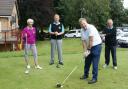 Mike Fitzpatrick on the first tee at the revamped Prestwich Golf Club watched by Barbara Elliott, Derek Hopkins and Pete Howard