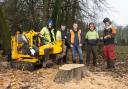 Cllr Alan Quinn, centre, with the council's tree team and the new machinery