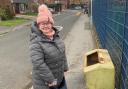Jessica Coop, 30, hides books at Tottington Primary School