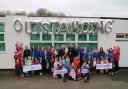 Staff and children at Tiddlywinks Nursery, Walmersley, celebrate it's 'outstanding' Ofsted rating