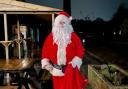 The Lamppost Cafe co-owner Mark Wellman-Riggs in a Santa suit