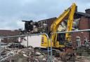 The demolition of homes on Nelson Street is ongoing