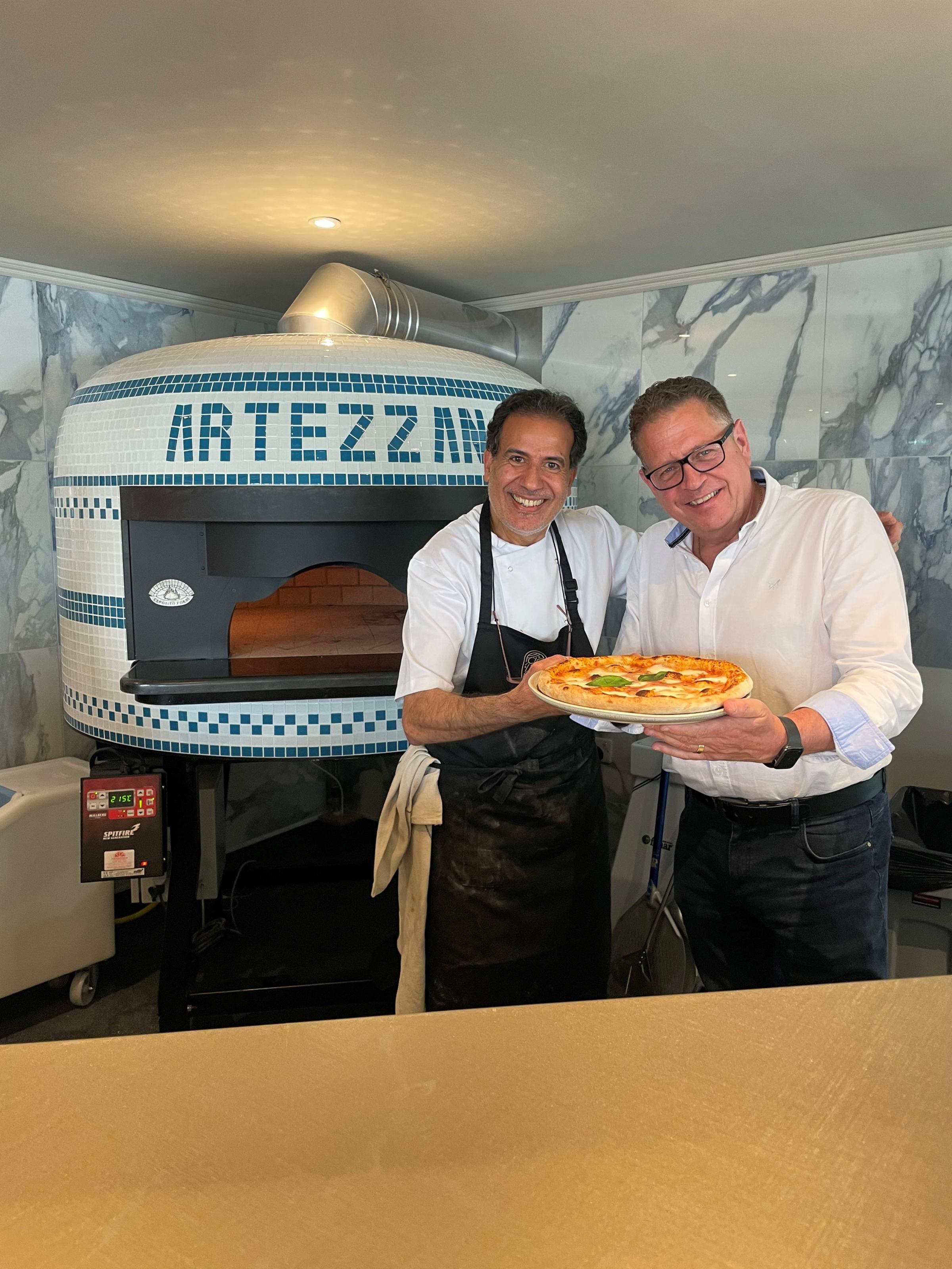 Artezzan - Pizza oven with chef and Jim Dorrington (right).