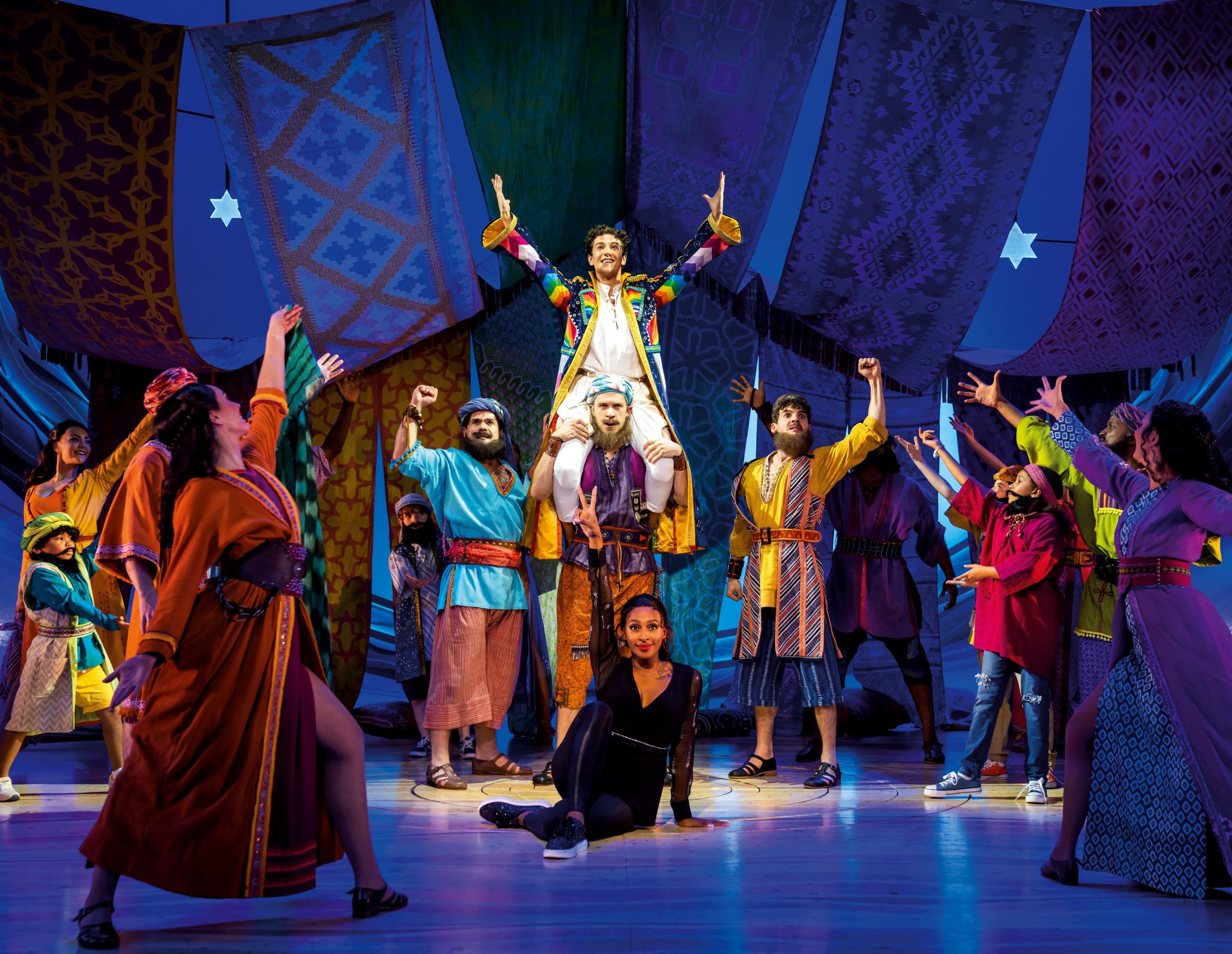 lexandra Burke as the narrator and Jac Yarrow as Joseph in Joseph and the Amazing Technicolor Dreamcoat (Picture: Tristram Kenton)